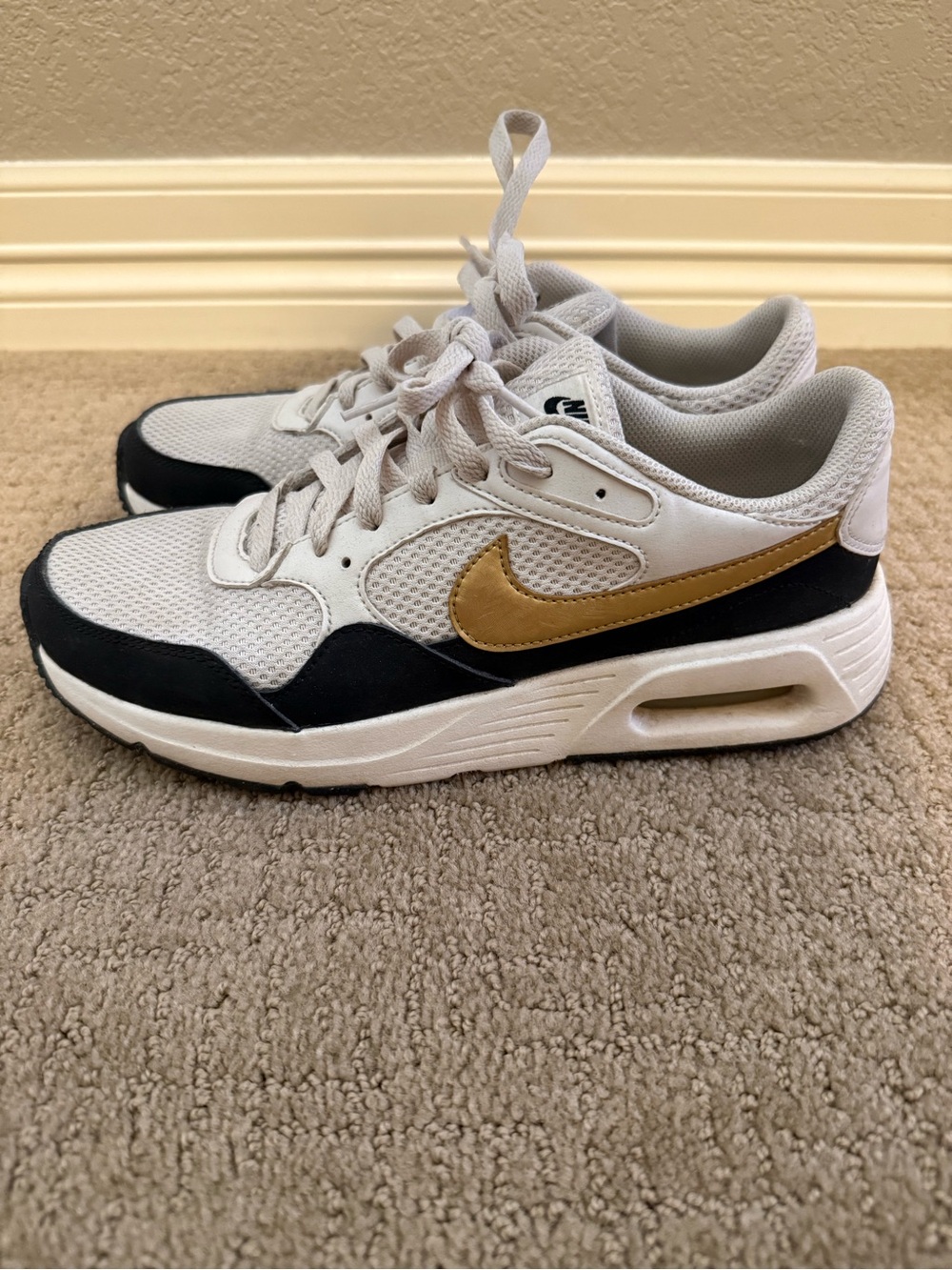 Nike White and Gold Low-Top Athletic Sneakers